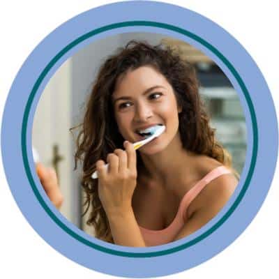 woman brushing teeth icon