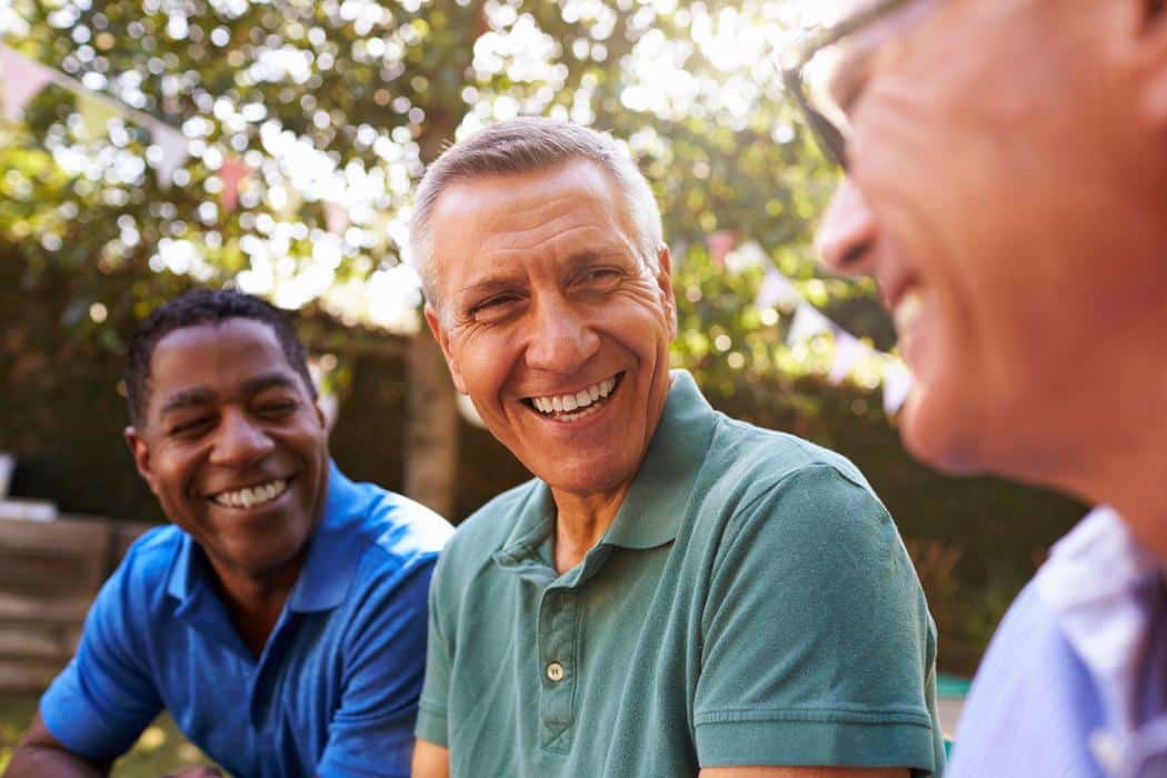 Men-laughing-outside-healthy-smiles Dental bridges