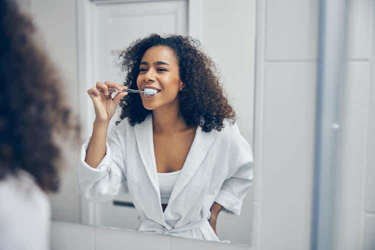 Woman-brushing-teeth-preventing-gum-disease Periodontal therapy